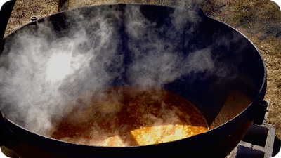 brunswick stew in a large pot outside