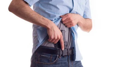 man with a concealed carry handgun