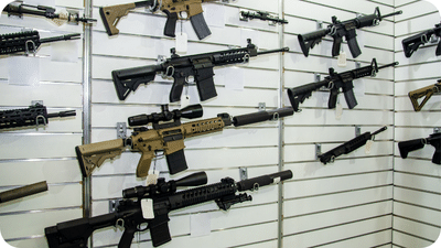 Rifles in a gun store hanging on the wall