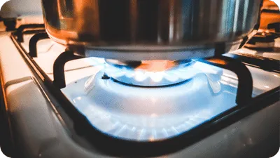 Pot on a lit gas stove