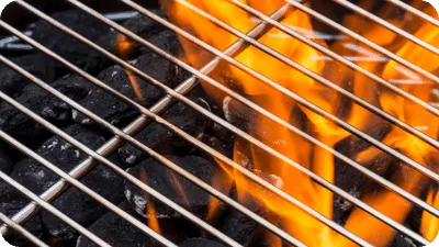 Charcoal grill burning