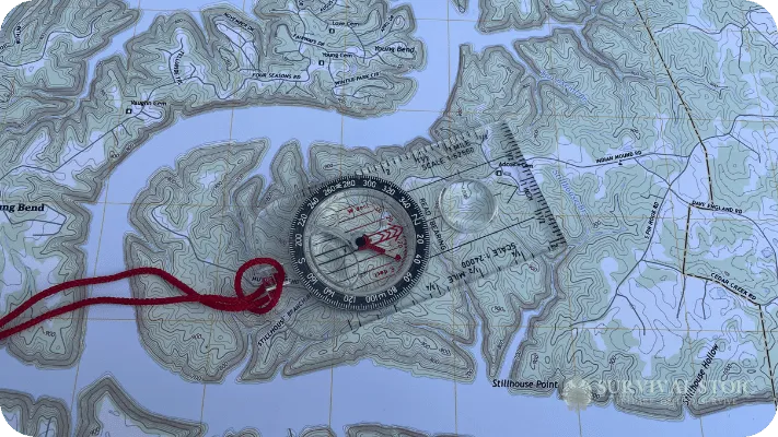 The author's Silva baseplate compass and map