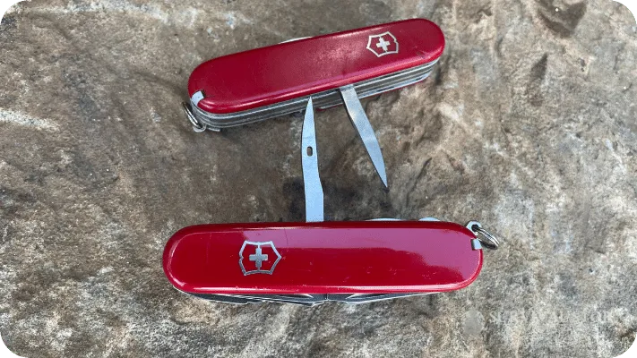 Two of Jason's multitools with the awls shown.