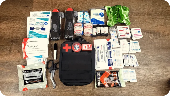 First Aid kit shown will all of the items on a table