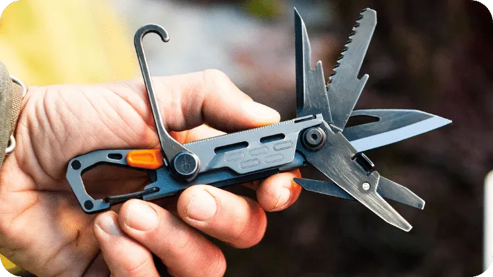 Man holding the Gerber Stake out Multitool.
