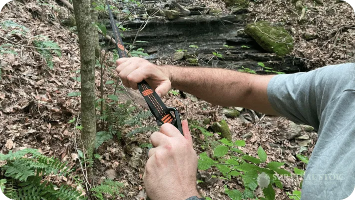 The author setting up the haven tent hammock straps