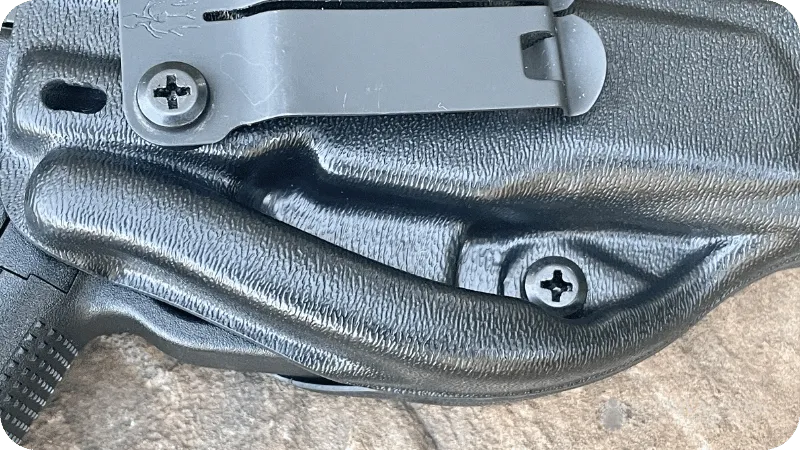 Jason's Glock 19 in a Harry's holsters Infiltrator showing a close up of the trigger area