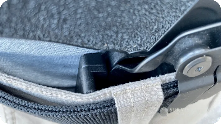 The author showing the wing attachment of a concealed carry holster