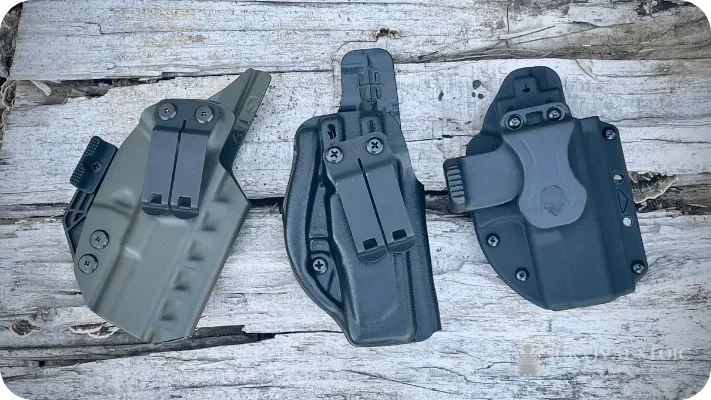 Three of the Jason's Kydex holsters