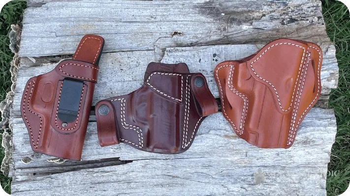 Three of the author's leather holsters. Two IWB and one OWB shown