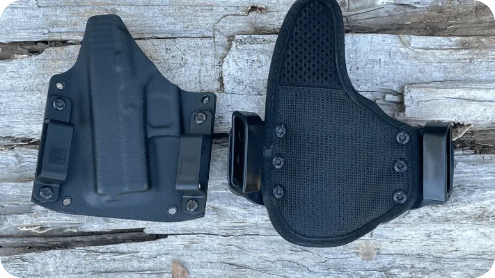 Two of the authors OWB holsters showing a flexible one and one that is not flexible
