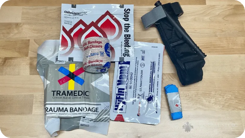 Trauma treatment items for a first aid kit