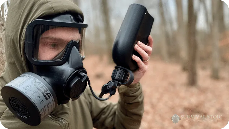 Blake using the canteen on the Mira CM-8M gas mask