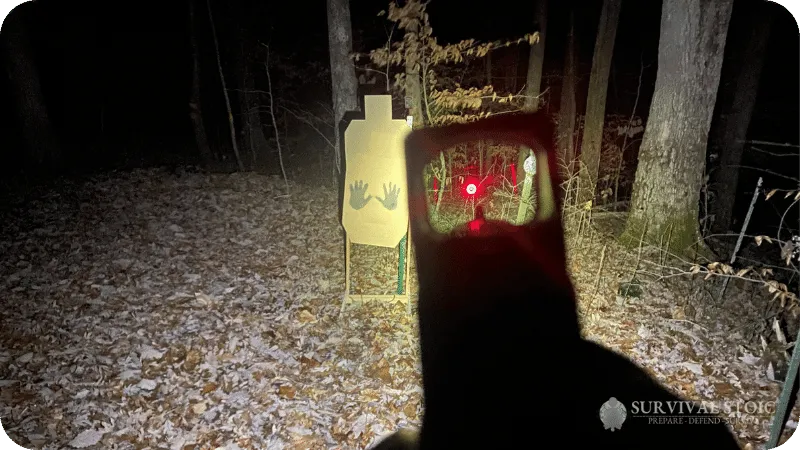 Jason showing aiming with a red dot at night