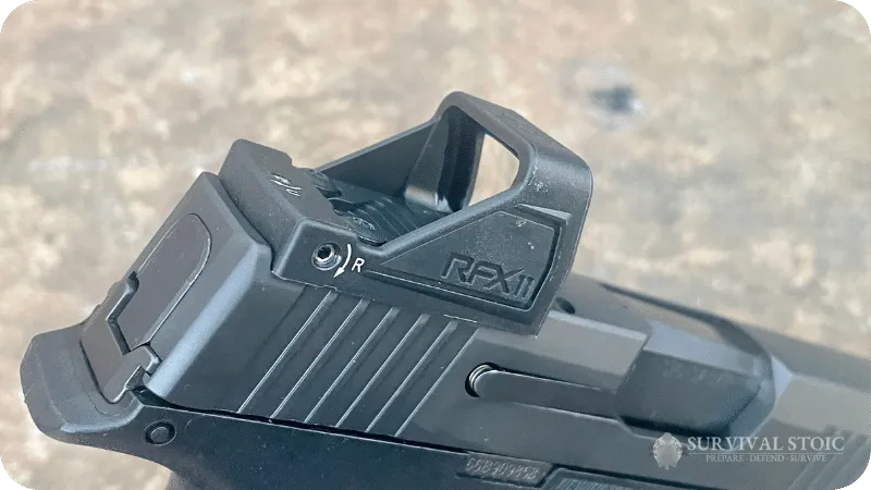The RFX11 mounted to Jason's handgun, shown from the right